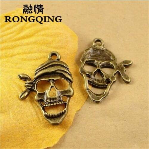 RONGQING 50pcs/lot Hollow Pirate Skull Charms 28*20MM Skull Pirate Pendants Punk Style Jewelry Supplier DIY Findings