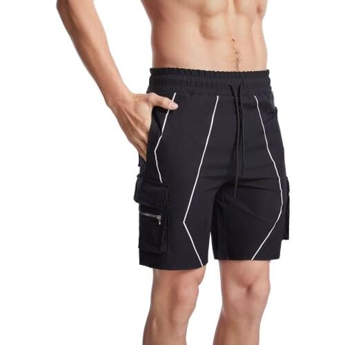 New muscle fitness brother male summer and autumn sports and leisure overalls outdoor training mountaineering squat pants