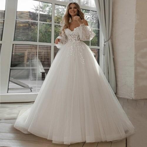 Jewel Neckline Lace Appliques A Line Wedding Dresses with Long Sleeves Vestidos De Noiva Floor Length Buttons Back Bridal Gowns