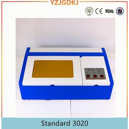 Free shipping 3020 co2 laser engraving machines laser cutting machines for rexine plywood , acrylic , rubber stamp , cloth felt