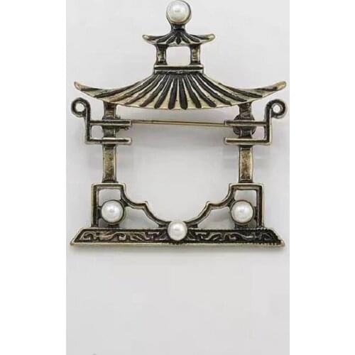 Chinese style retro pavilion pearl alloy autumn and winter new sweater cardigan coat trench coat fashionable all-match brooch