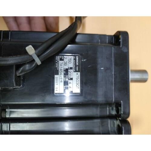 R88M-W75030T , servo motor , used in good condition . 80% appearance new , good working , free shipping