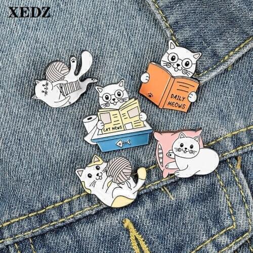 Cute kawaii yarn ball cat reading cat lapel pin playful cat reading cat pillow cat fashion lapel sweater badge gift for friends