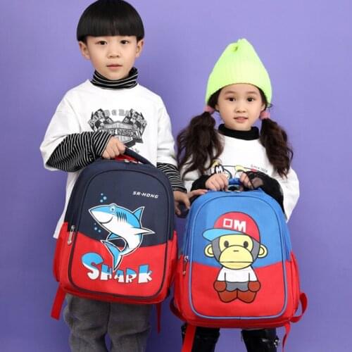 Young childrens schoolbag new first-grade boys and girls cartoon cute light-weight and portable spine protection backpacKM12005