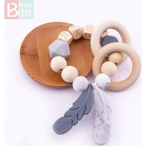 Bite Bites 1PC Food Grade Silicone Feather Teether Chewing Custom Bracelets Baby Care Products Wooden Teething Ring Baby Teether