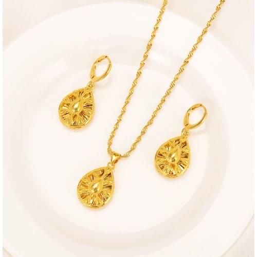 Bangrui 2021 Elegant Gold Color Hollow Out Oval Pendant Necklace Drop Earrings Fashion Jewelry Sets African Jewelry Gifts