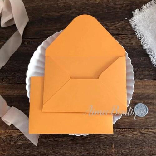 Orange color invitation envelope