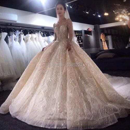 Dubai Wedding Dress Luxury Long Sleeve Court Train Sequins Beading Light Champagne Wedding Ball Gowns Vestido De Novia Kaftans