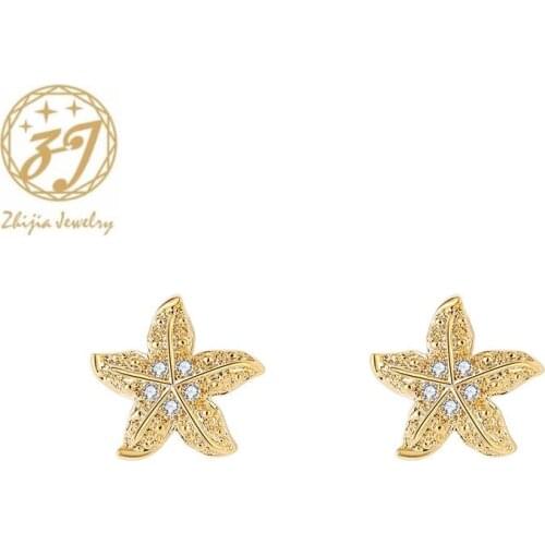 Zhijia new arrival delicate golden flower shape design stud earrings luxury shiny crystal rhinestone women earrings gifts