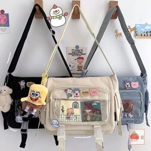 Large-capacity student messenger canvas bag female 2021 new Japanese Harajuku solid color messenger shoulder tote bag