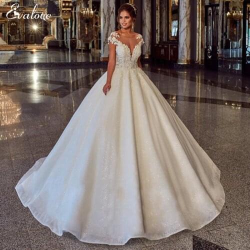 EVALOVE New Elegant Scoop Neck Cap Sleeve Bride A-Line Wedding Dress Luxury Beading Appliques Sparkly Tulle Princess Bridal Gown