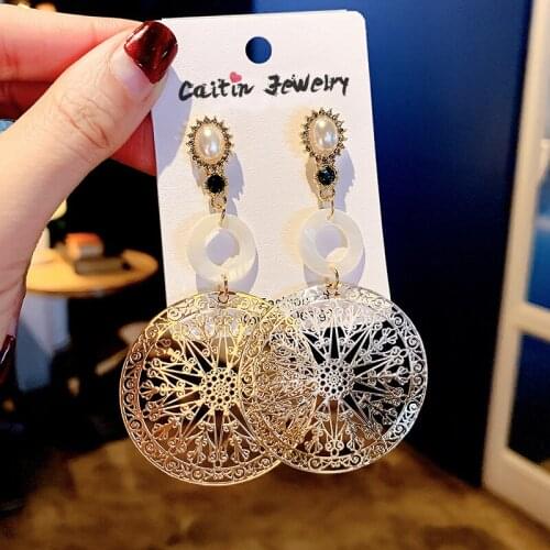 Europe and the United States popular exaggerated temperament long earrings big earrings, hollow carved round metal Earrings