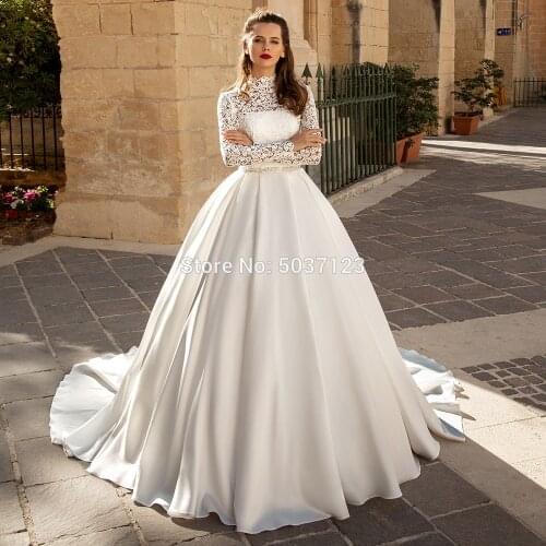 Attractive Lace Long Sleeves Wedding Dresses High Neck Ball Gown Beaded Sash Bride Wedding Gowns Buttons Back Vestido de Noiva