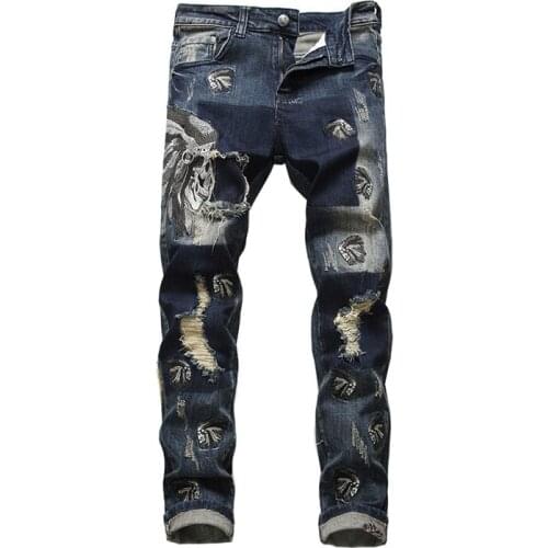 Sokotoo Mens tribe chief embroidery ripped jeans Holes distressed blue stretch denim pants