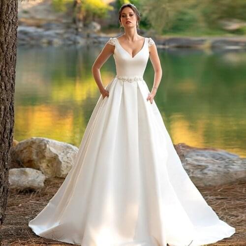 New Design Princess V-neck Matte Satin Ball Gown Wedding Dress with Pocket Beaded Belt Backless Bridal Gowns vestidos de novia