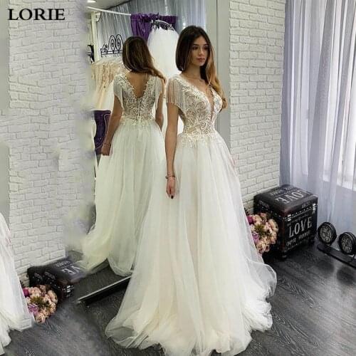 LORIE Sexy Boho Wedding Dress A Line with Tassel V Neck Appliqued Lace Bride Dresses Corset Wedding Gown Vestidos de novia