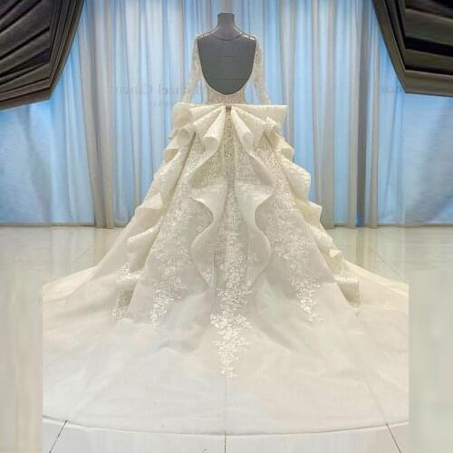 2021 Square Neck Wedding Dress In Dubai Sexy Long Sleeves Sheer Backless Extra Puffy Long Train Bridal Arabic Wedding Gowns