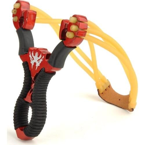 Red Alloy slingshot, outdoor hunting fishing shooting a slingshot. Outdoor shooting toys, childrens classic toys