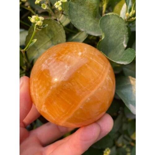 Beautiful natural orange calcite crystal ball natural energy crystal ball 55-60mm