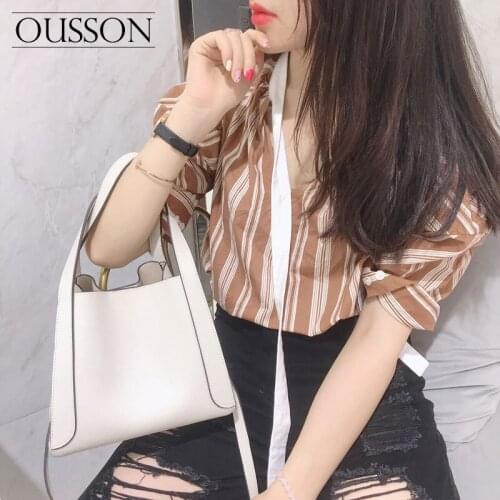 OUSSON fashion casual light and versatile one-shoulder messenger portable first layer cowhide commuter trend bucket bag