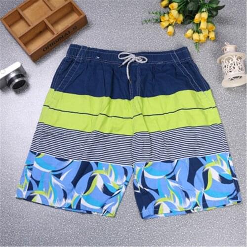 Summer loose large size quick dry, fashionable mens beach pants shorts shorts mens five-minute casual sports pants J001