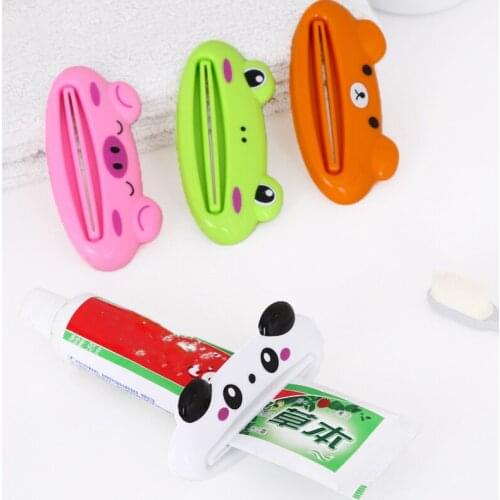 1Pcs Cartoon Toothpaste Squeezer manual squeezer Household Rolling toothpaste clip facial cleanser press Bathroom Accessories