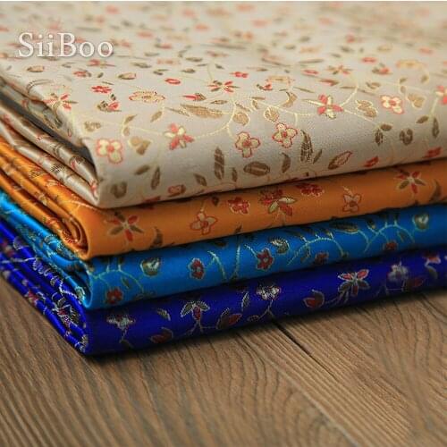 Pastoral style elegant orange blue floral jacquard brocade fabric for dress coat cloth fabric for sewing telas tecidos SP4401