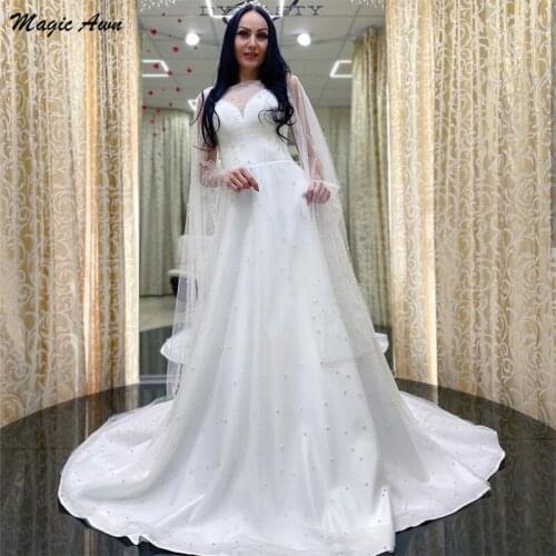 Magic Awn Modest Long Sleeves Wedding Dresses Boho Pearls Beaded Princess Beach A-Line Mariage Gowns Lace Up Back Abito Da Sposa