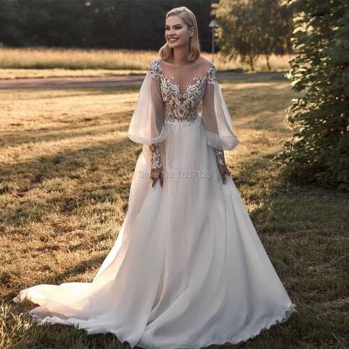Sheer Scoop Neck Wedding Dress 2021 A-Line Long Sleeve With Sweep Train Lace Appliques Illusion Backless Women Bridal Gowns