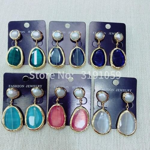 Simple atmosphere personality retro fashion temperament round elegant cat-eye pearl earrings