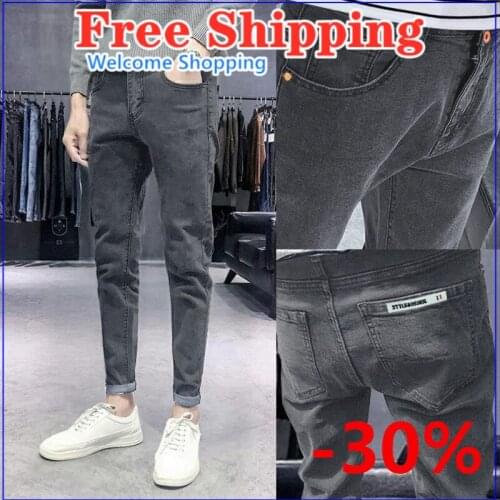 Spring and summer mens stretch jeans mens Korean version trend slim feet pants casual joker black trousers