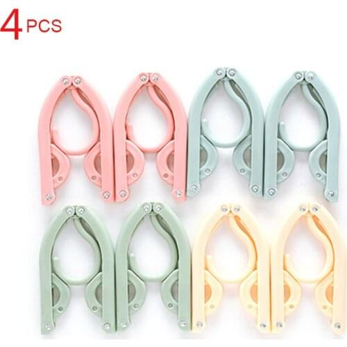 4 Pcs Travel Portable Folding Hanger Multifunction Stretch Clothes Plastic Travel Hangers Coat Towel Socks Storage Foldable Rack