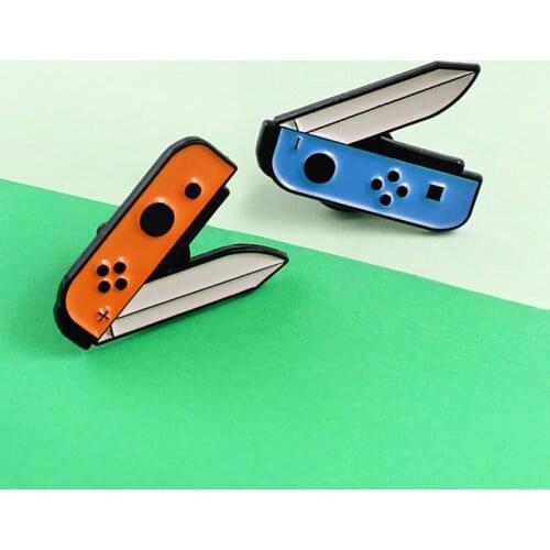 Enamel Pins Orange blue Knife gamepad game handle Brooches Switch Nintendo Game handle for Women Badge Jewelry Spille Bijoux