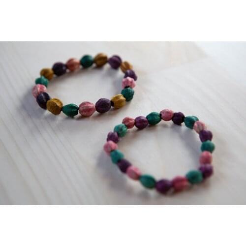 Eolisa Partners Handmade, elastic, natural seed bracelets