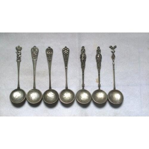 7 different types of Russian Coins spoons -the coin is random