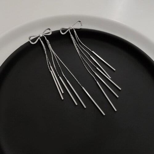 U-Magical Knotted Silver Color Metallic Bow-knot Long Tassel Dangle Earring for Women Hollow Out Earring Jewelry Accessories