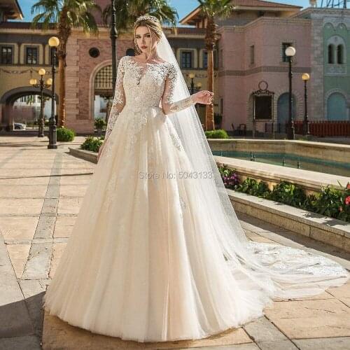 Long Sleeves Wedding Dresses Champagne Lace Appliques Scoop Neckline Backless Floor Length Wedding Bride Dress 2019 Formal