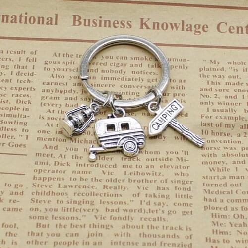 Fashion jewelry mini camping lantern happy keychain, road sign, handmade car charm camping travel keychain