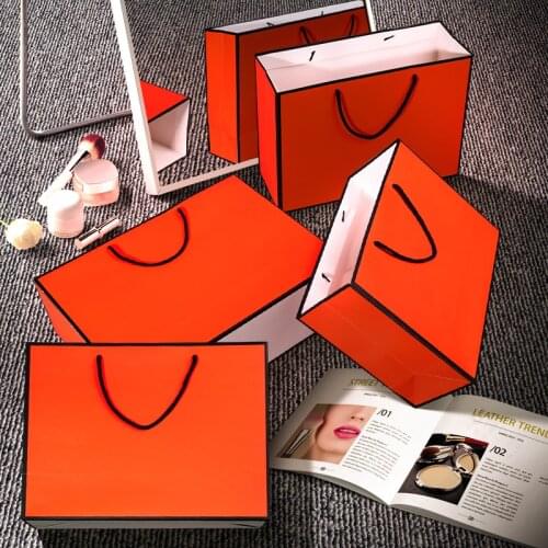 10pcs/lot large Orange kraft paper packaging bag,garment gift paper bag with handles, small blank paper shopping bag