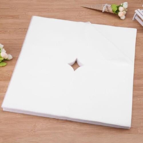 Hot Sale 100pcs Disposable Non-woven Fabric Face Hole Mat Bed Pillow Towel Cover for Beauty Massage Salon Supplies Wholesale