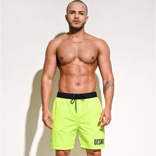 Solid men beach shorts swim trunks sexy swimwear 2021 new gym sports board swimming pool party shorts men bikini swimsuits