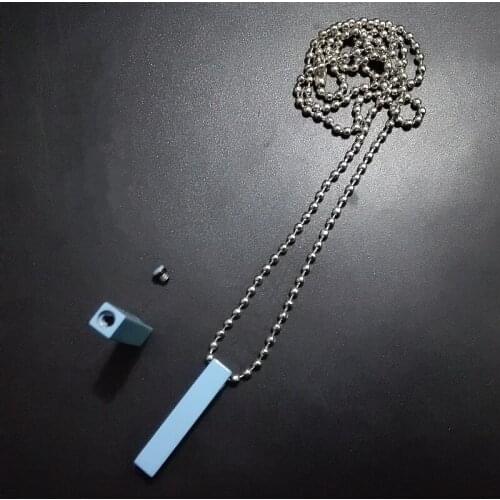 Creative Miniature Hollow Titanium Steel Stainless Steel Necklace Bracelet Pendant Male And Female Key Pendant Storage Bottle