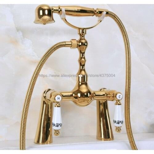 Polished Gold Brass Deck Mounted Bathroom Bathtub Shower Faucet Double Ceramic Handle with Hand Held Shower Nna138