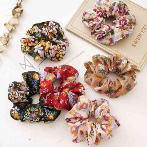 Korean version of the new floral small fresh hair ring large intestine ring jewelry wind girl wild sweet cloth ring manufacturer