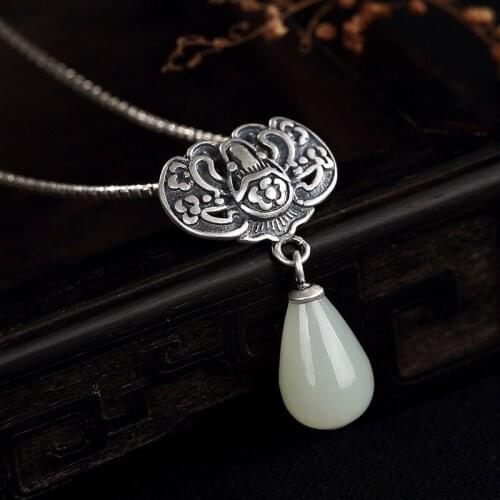 S925 pure silver natural Hetian jade white jade mosaic plum blossom Fu in front of ladys clavicle pendant wholesale