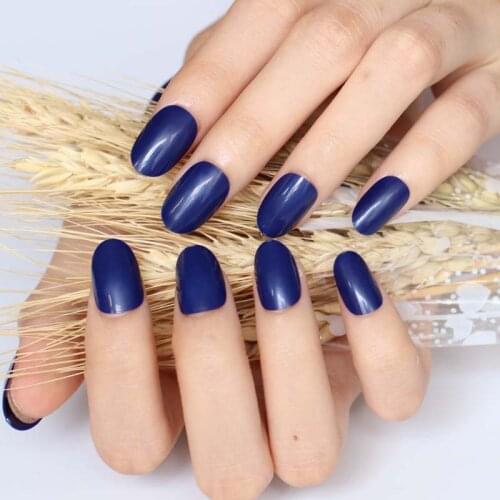 New 24pcs Adorable fashion candy oval decorative fake nails long round section deep blue P94X
