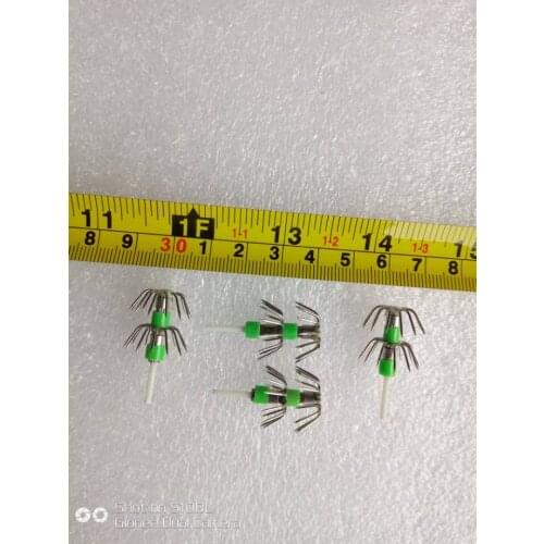 MR OCTOPUS 200pcs fishing hook , squid jigs , squid hook , outsider diameter is about 1.7cm . and it with glow plastic tube