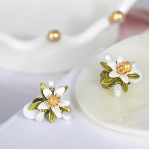 Net red retro freshwater pearl orange flower fresh and beautiful ear clips