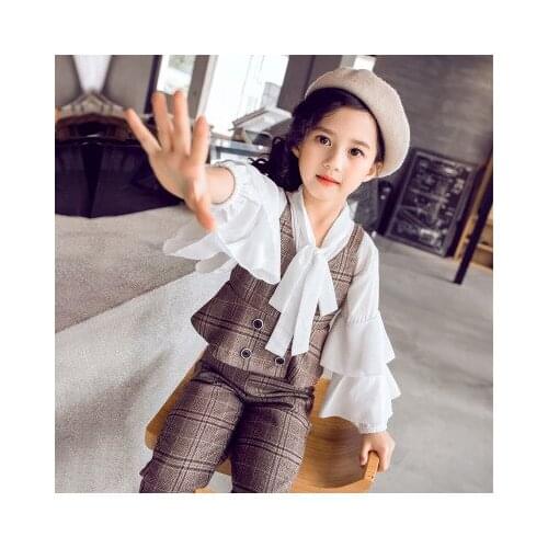 New 5-10 year old girl baby fashion suit spring and autumn clothing girl fashionable shirt children plaid clothing tide