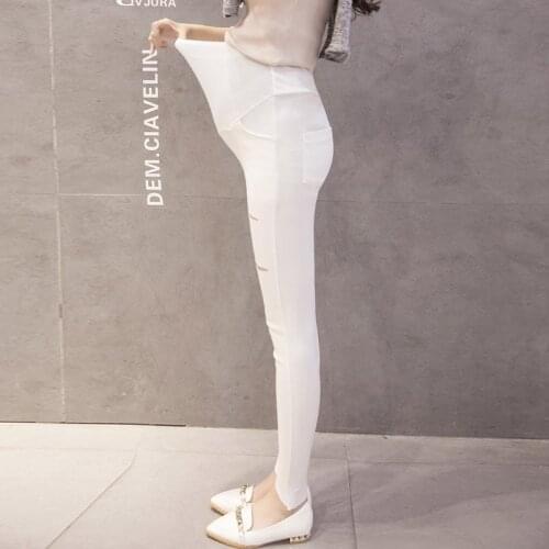 2018 autumn and winter pregnant women pants fashion hole irregular pencil pants new Korean fashion trousers